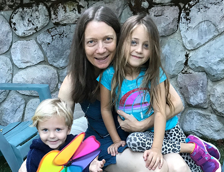 The author, Christine Staub, with her grandchildren.