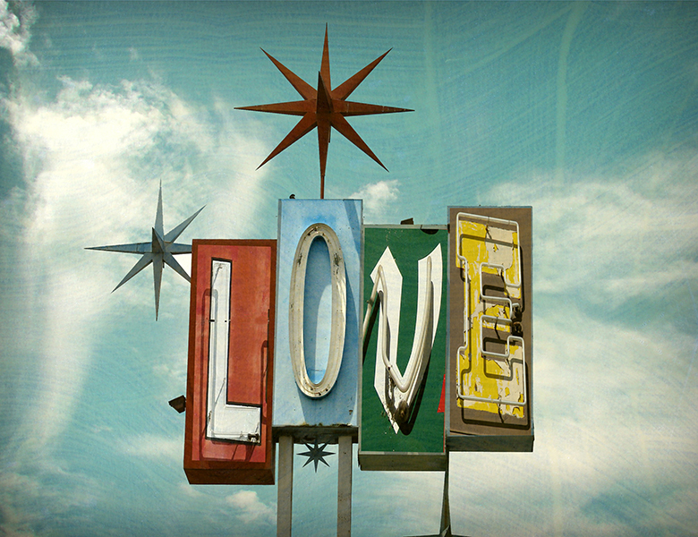 The genius of non-judgement. Retro "Love" sign.