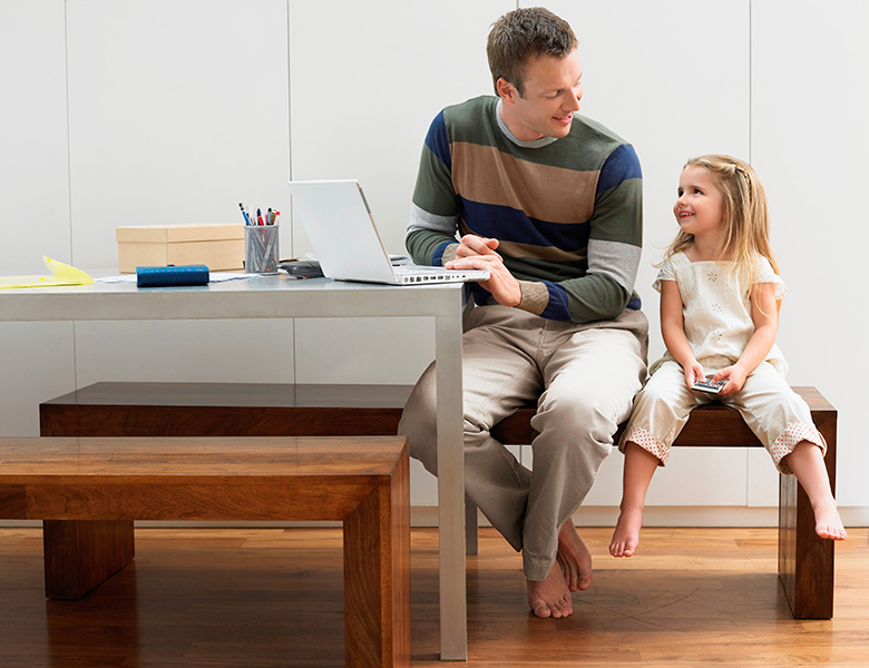 Father and daughter at work together. Mindful parenting.